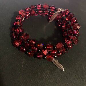 Handmade 'No More Stolen Sisters' coil bracelet